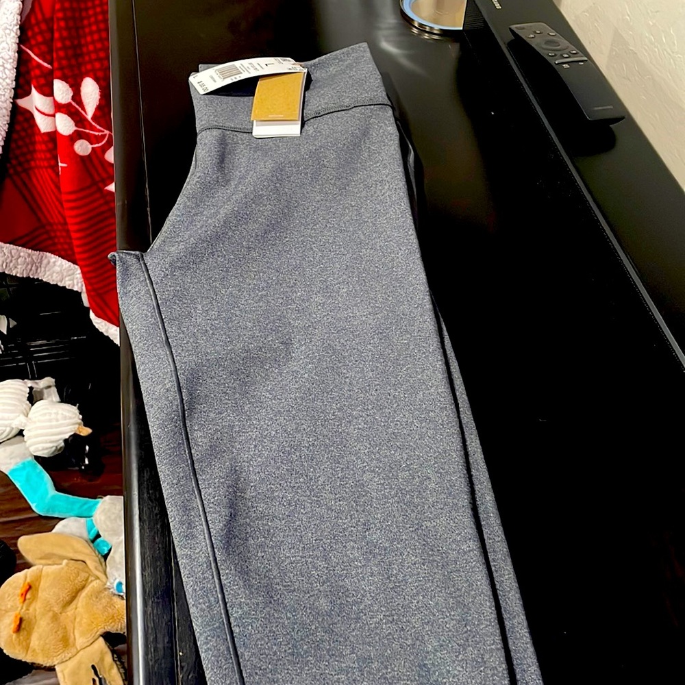 Brand New  Womens Adidas work out leggings.   grey size LG but fits like a Med